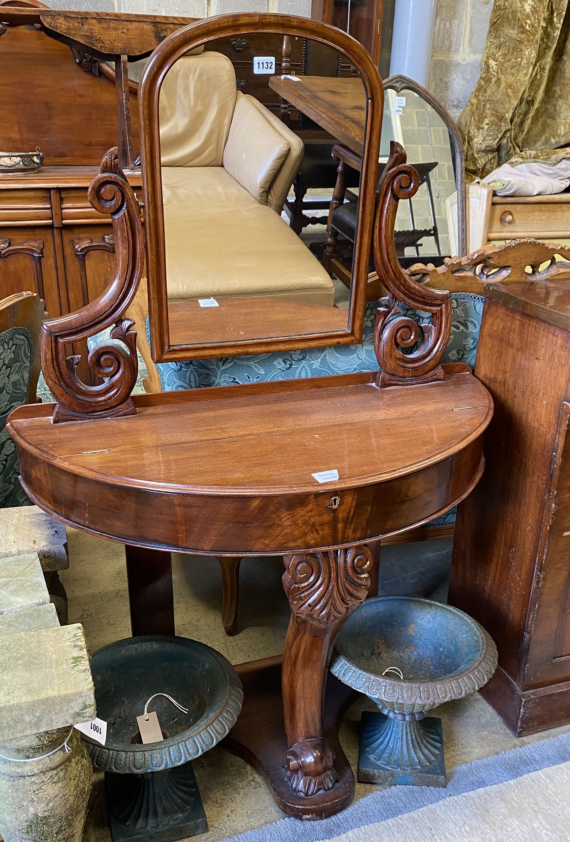 A Victorian mahogany D shaped Duchess dressing table, width 90cm, depth 40cm, height 129cm